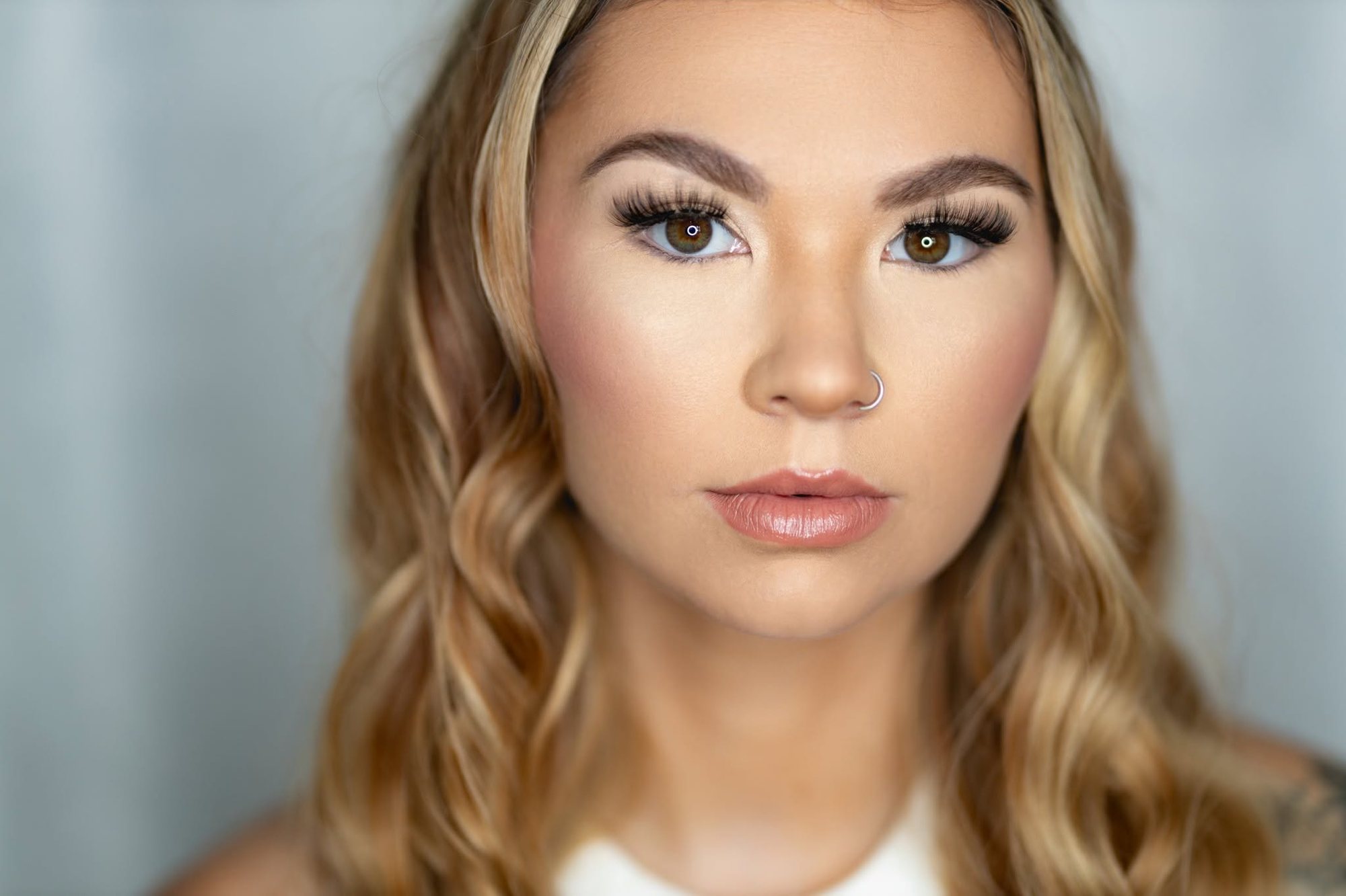 Close-up senior beauty portrait with professional hair and makeup