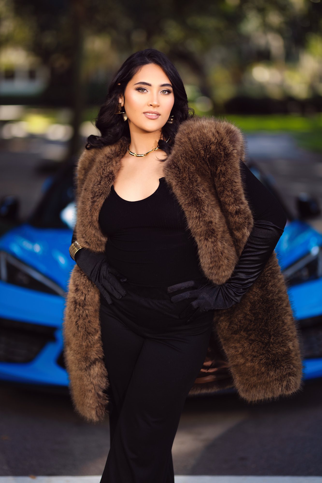 Senior girl in a fur coat and black gloves beside a sports car — senior pictures, Mishawaka, Indiana